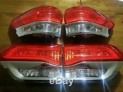 2014-2016 JEEP GRAND CHEROKEE OEM CHROME TAIL LIGHTS. PACKAGE DEAL U. S Version