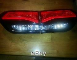 2014-2016 SRT JEEP GRAND CHEROKEE TAIL LIGHTS and LIFTGATE LAMPS. Package deal